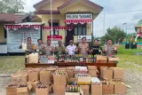 Polsek Tabang Sita Ratusan Botol Miras Ilegal dalam Razia Gabungan di Kutai Kartanegara