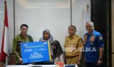 TASPEN Serahkan Manfaat JKK dan THT bagi Ahli Waris Petugas Damkar DKI Jakarta
