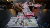 Rupiah Ditutup Melemah ke Rp18.055 per Dolar AS, Bank Indonesia Optimalkan Triple Intervention dan SRBI